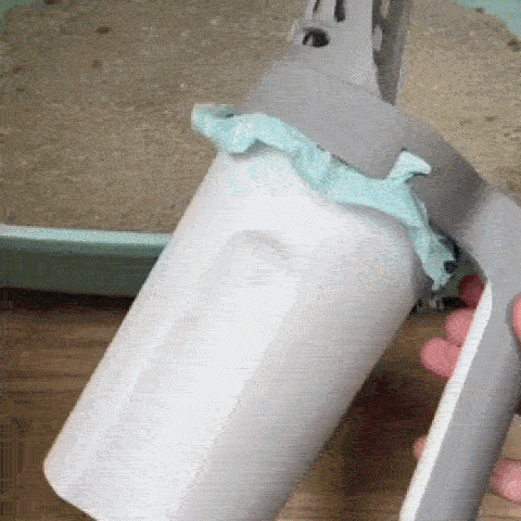 Pelle à litière chat ScoopKit avec grille filtrante et sac intégré dans le manche