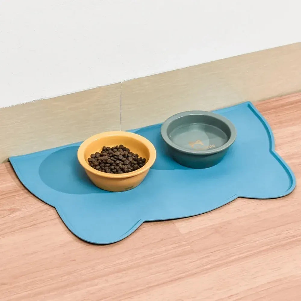 Tapis gamelle chat silicone bleu avec bords surélevés pour eau et croquettes